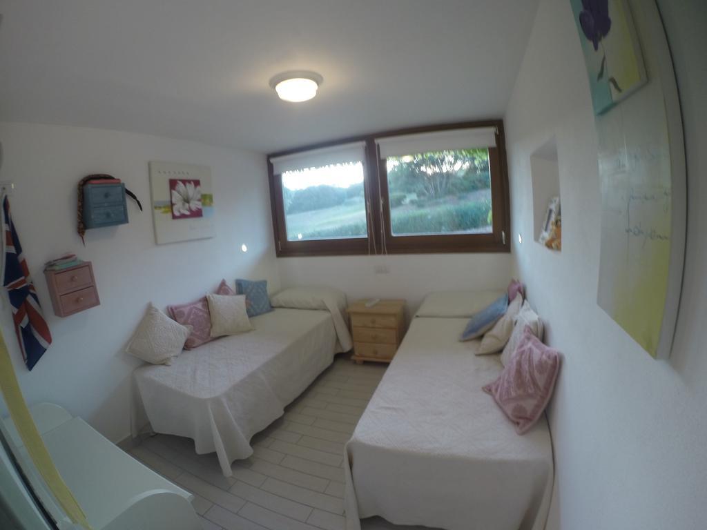 Luxury Apartment Sardegna Portisco Szoba fotó